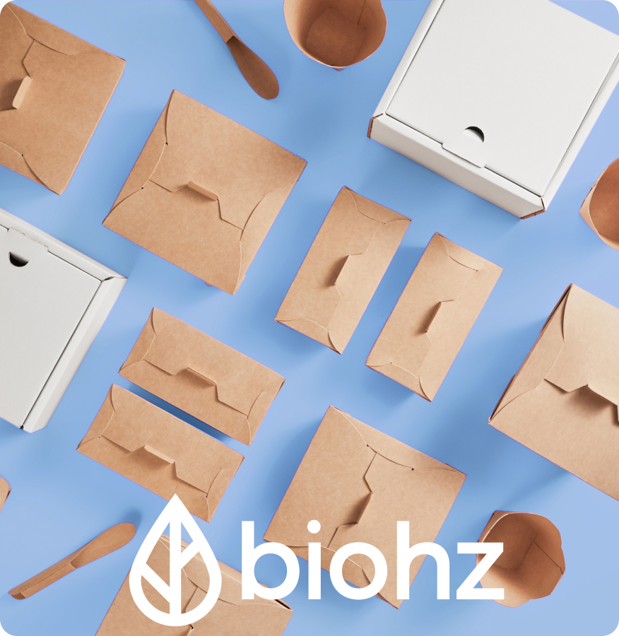 En la imagen se muestra el logo Biohz con cajas de cartón color cafe y blanco.